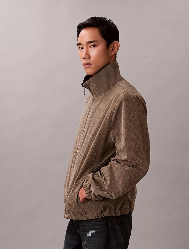 Veste réversible avec logo emblématique sur toute la surface Veste réversible avec logo emblématique sur toute la surface