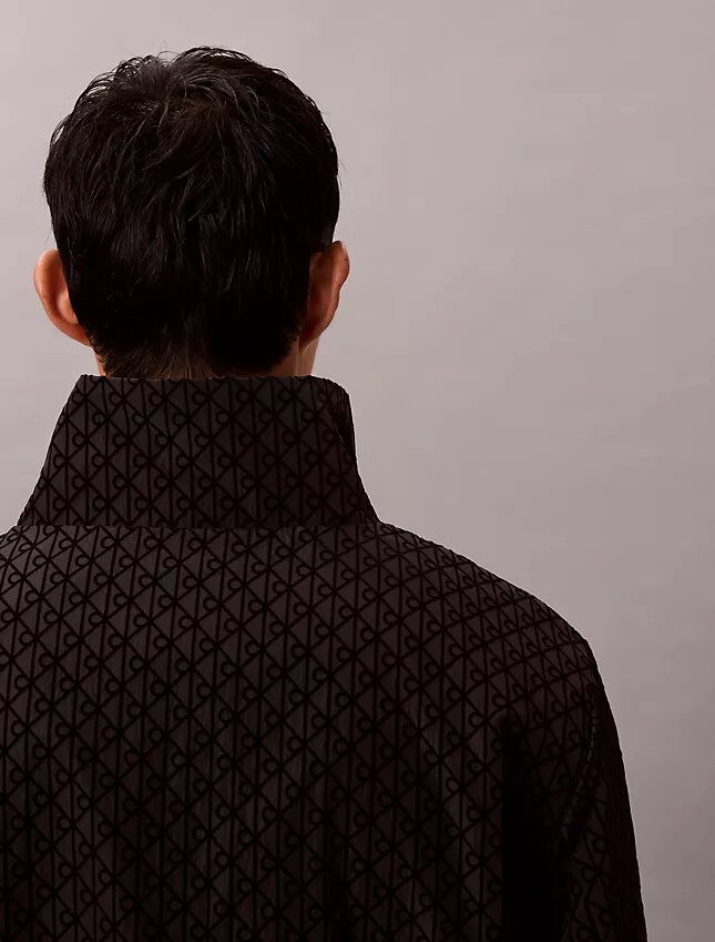 Veste réversible avec logo emblématique sur toute la surface Veste réversible avec logo emblématique sur toute la surface