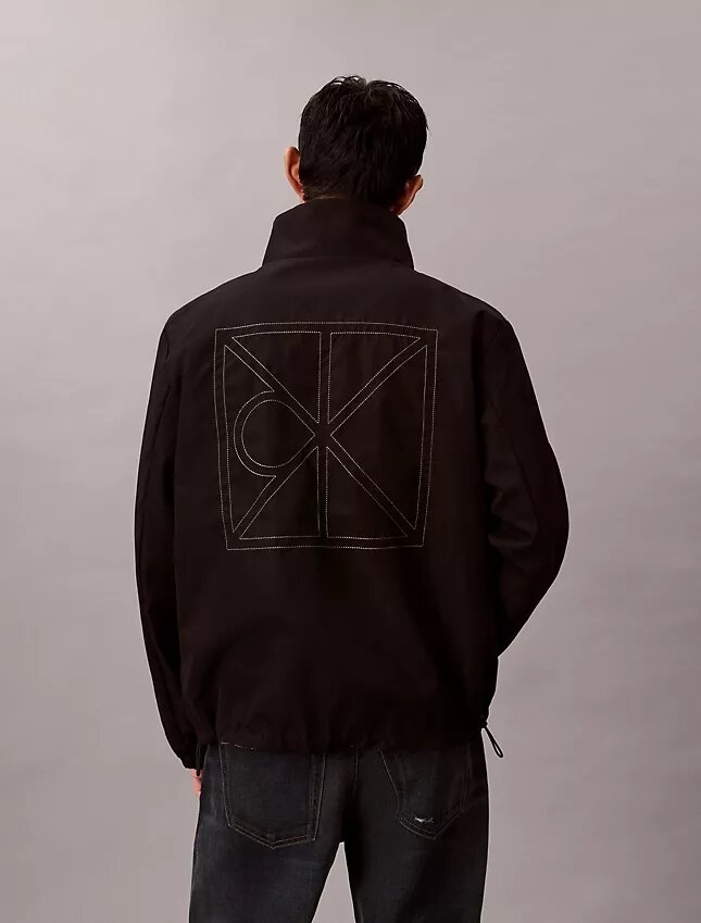 Veste réversible avec logo emblématique sur toute la surface Veste réversible avec logo emblématique sur toute la surface