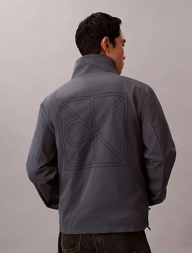 Veste réversible avec logo emblématique sur toute la surface Veste réversible avec logo emblématique sur toute la surface