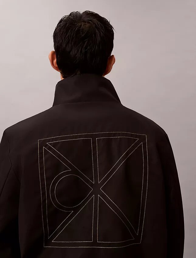 Veste réversible avec logo emblématique sur toute la surface Veste réversible avec logo emblématique sur toute la surface