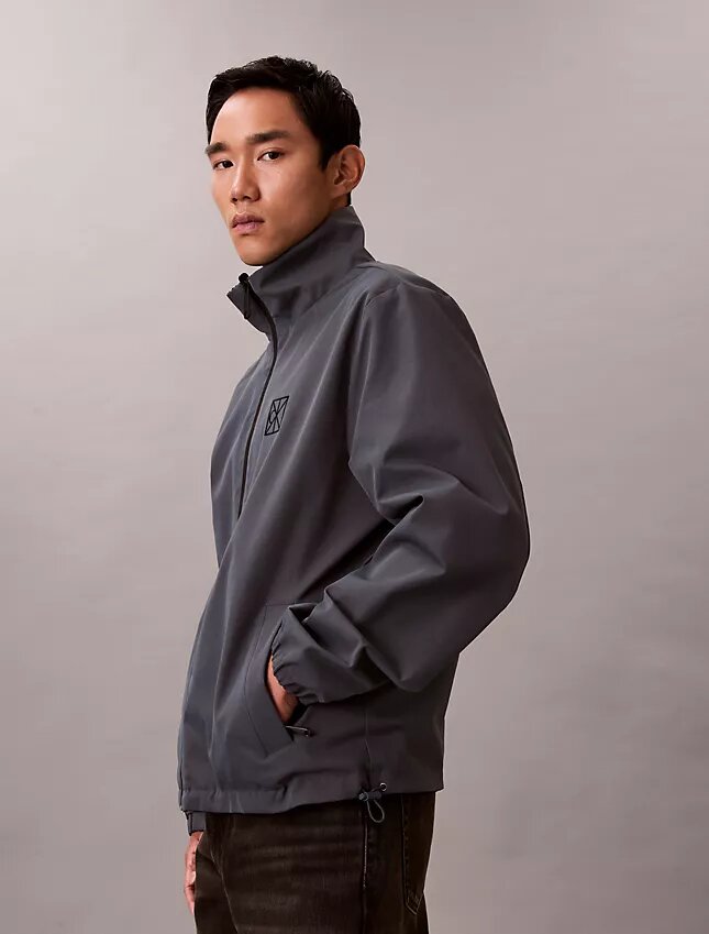 Veste réversible avec logo emblématique sur toute la surface Veste réversible avec logo emblématique sur toute la surface